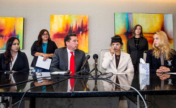 Ashley Solis, the first Jane Doe plaintiff in the Deshaun Watson lawsuits, at a press conference with lawyer Tony Buzbee